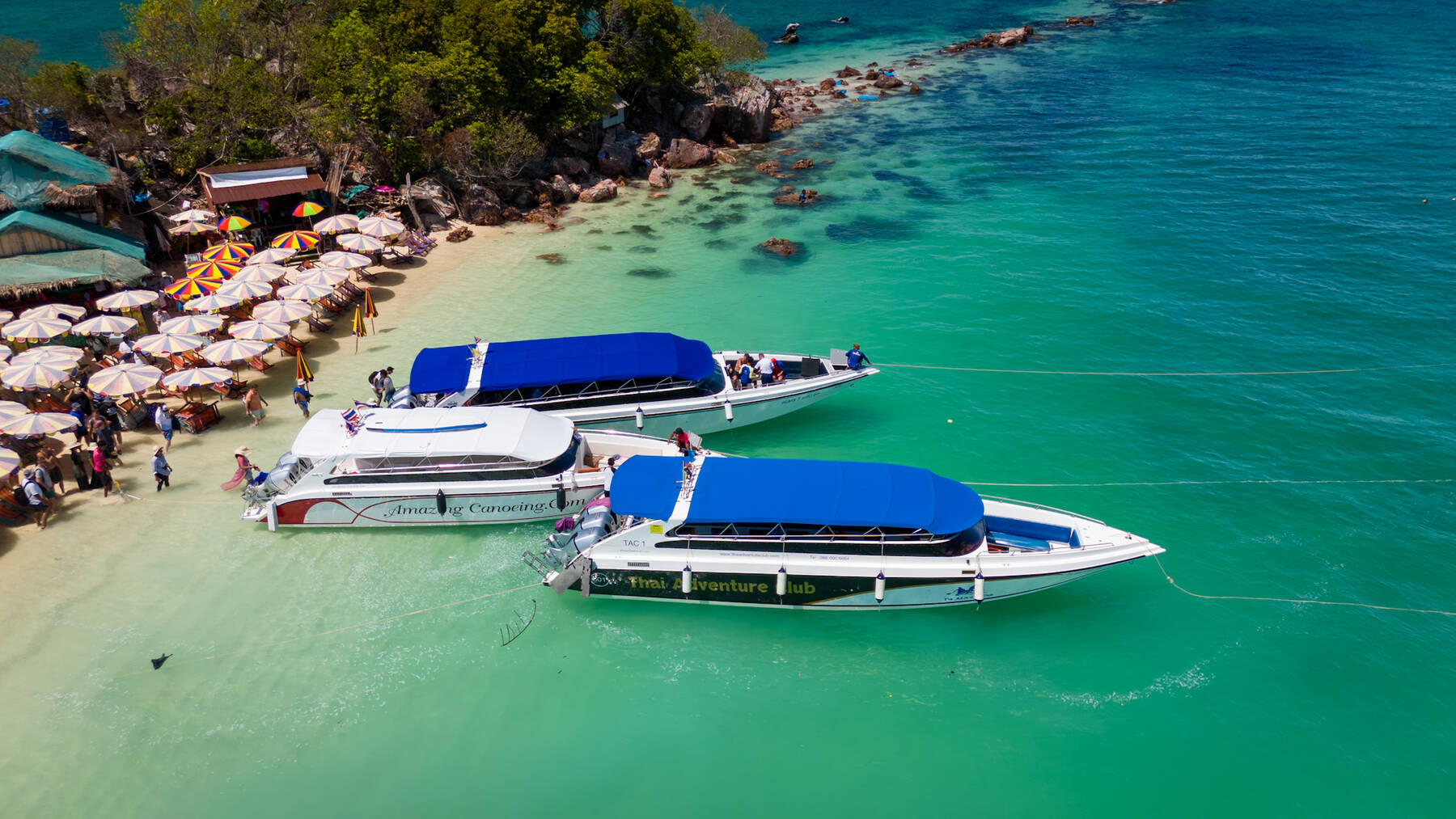 Aerial view of speedboats moored near the beach at Khai Island